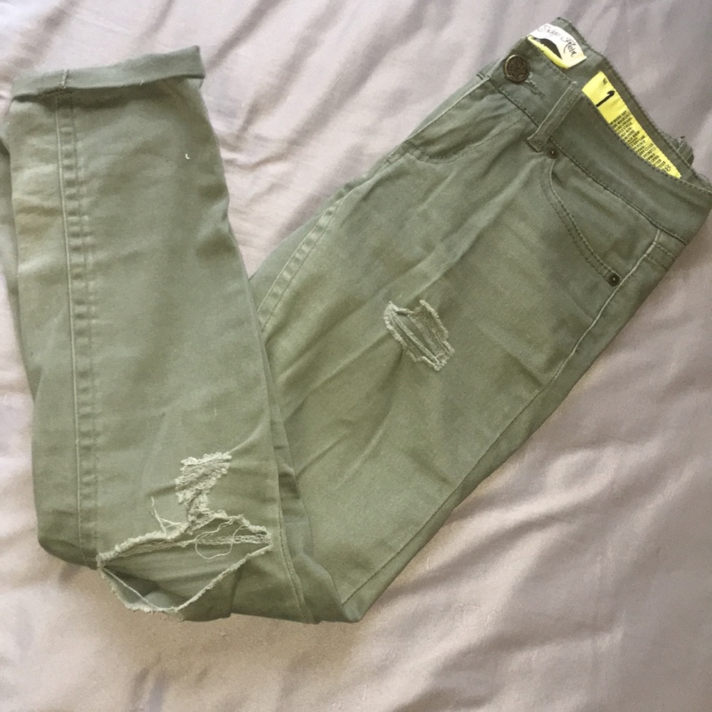 Army green ripped skinny jeans